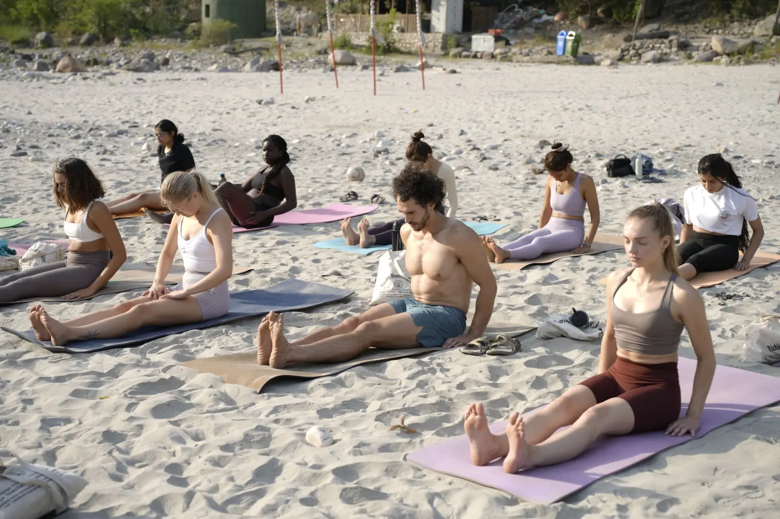 yoga at ganga beach in rishikesh